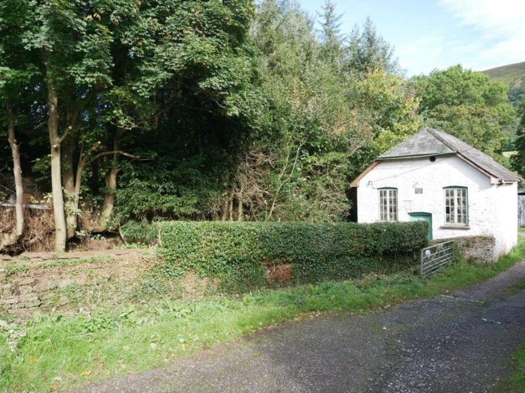 Charming former chapel in Brecon Beacons National Park for sale at £70,000. Nestled in scenic Honddu Valley, this 418 sq ft property offers unique rural retreat potential.