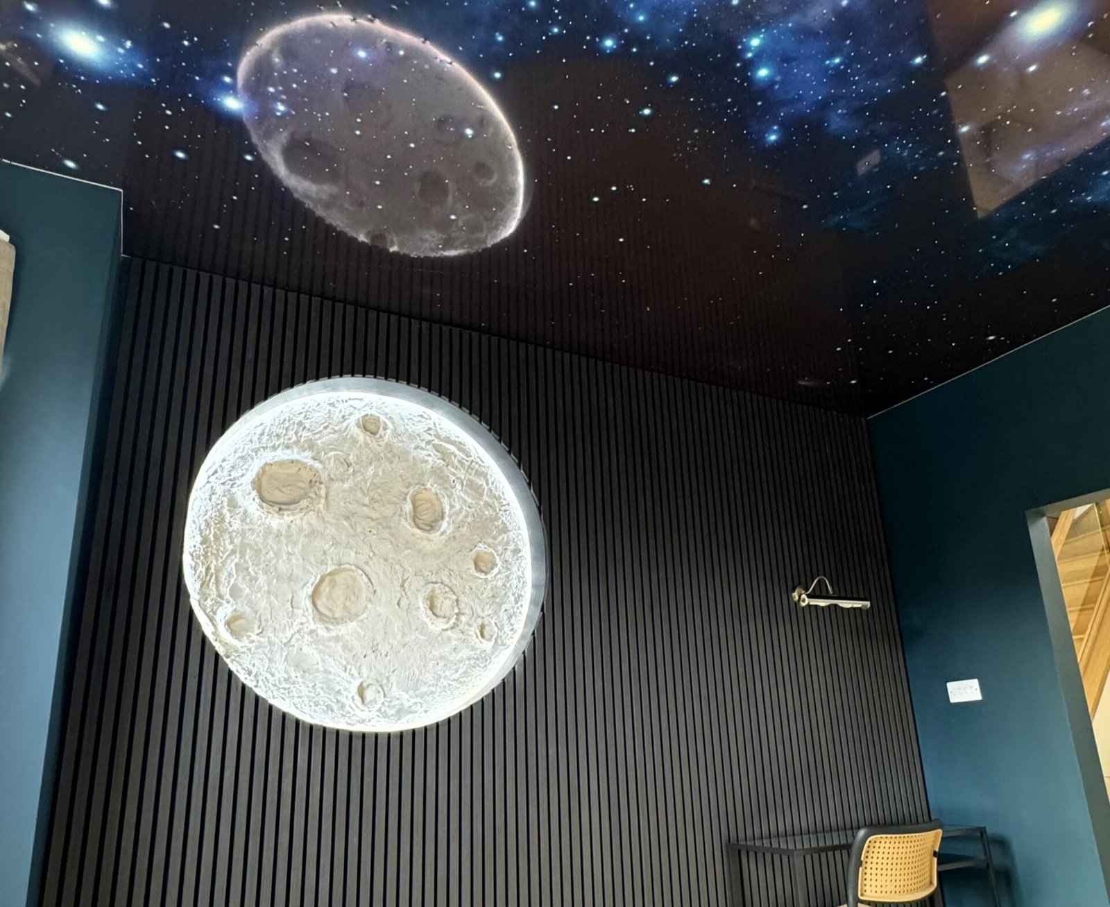 Property investor’s £50,000 renovation of a student house sparks debate, featuring a ‘Moon Room’ with LED-lit moon and starry ceiling to redefine student housing.