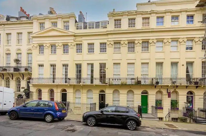 Brighton studio flat likened to a "cupboard" hits the market for £160,000. Tiny mezzanine bed area and open-plan kitchen just seconds from the sea spark reactions.