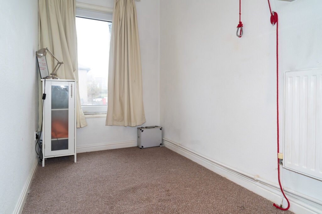 Two-bedroom Newport home hits the market for £125,000, hiding a secret fetish room with bondage gear. Ideal for investors, it generates £9,100 annual rental income.