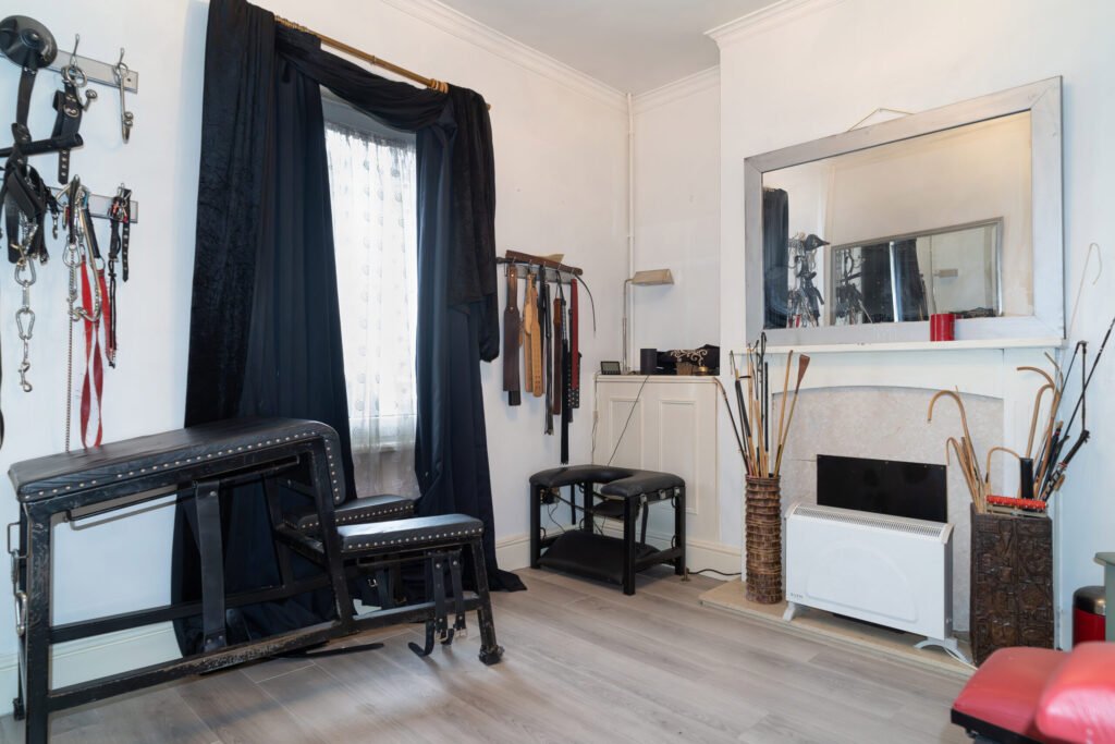 Two-bedroom Newport home hits the market for £125,000, hiding a secret fetish room with bondage gear. Ideal for investors, it generates £9,100 annual rental income.