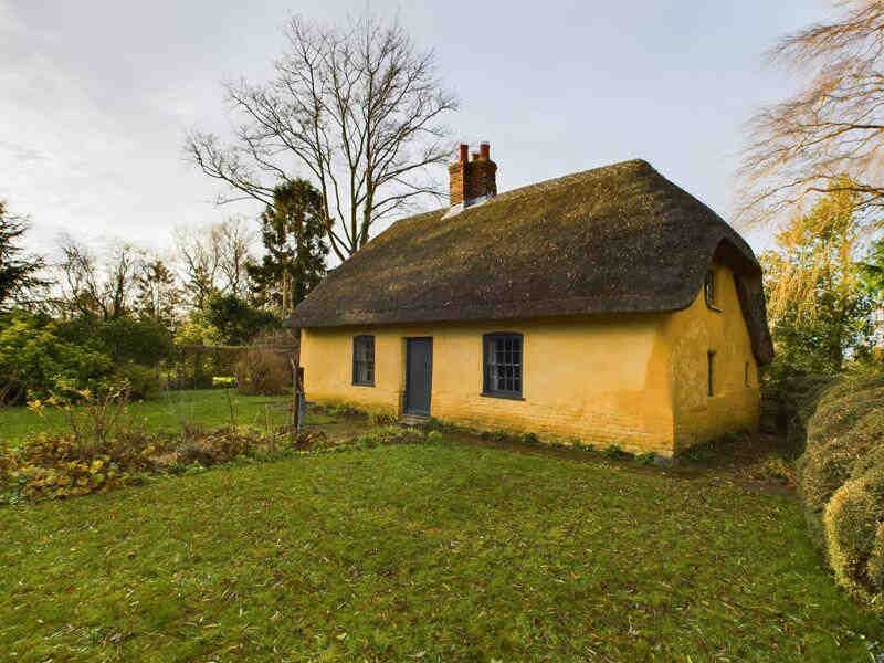 A rare 18th-century mud and stud cottage in Little Steeping, Lincolnshire, is on the market for £220k. With a thatched roof and period charm, it’s a portal to the past!