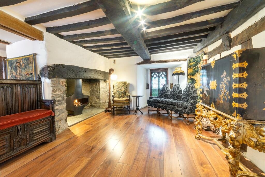 Grade II listed Conwy cottage, built in 1441, shocks buyers with a giant high heel bathtub. Quirky design meets medieval charm in this £875,000 one-of-a-kind home.