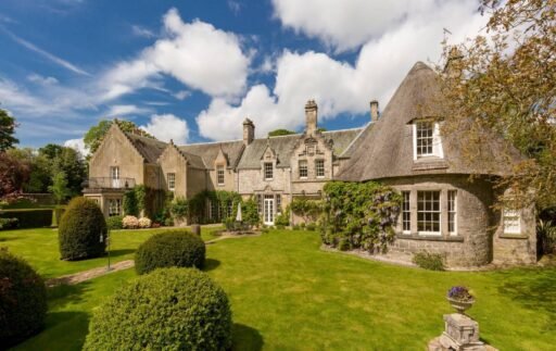 Explore Barony House, Sir Walter Scott's historic home near Edinburgh, now on sale for £1.8M. This six-bed mansion boasts rich literary history and 4.5 acres of gardens.