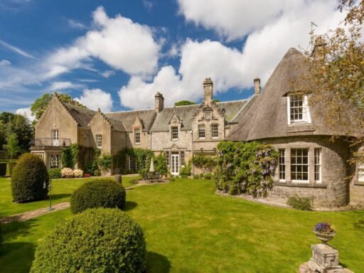 Explore Barony House, Sir Walter Scott's historic home near Edinburgh, now on sale for £1.8M. This six-bed mansion boasts rich literary history and 4.5 acres of gardens.