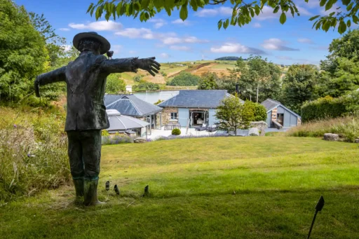 Explore Rectory Barn, a £4.5M luxury Salcombe home featuring a secret wine cellar, stunning estuary views, 1.56 acres, 4 bedrooms, and a hydro pool gym. Coastal elegance!