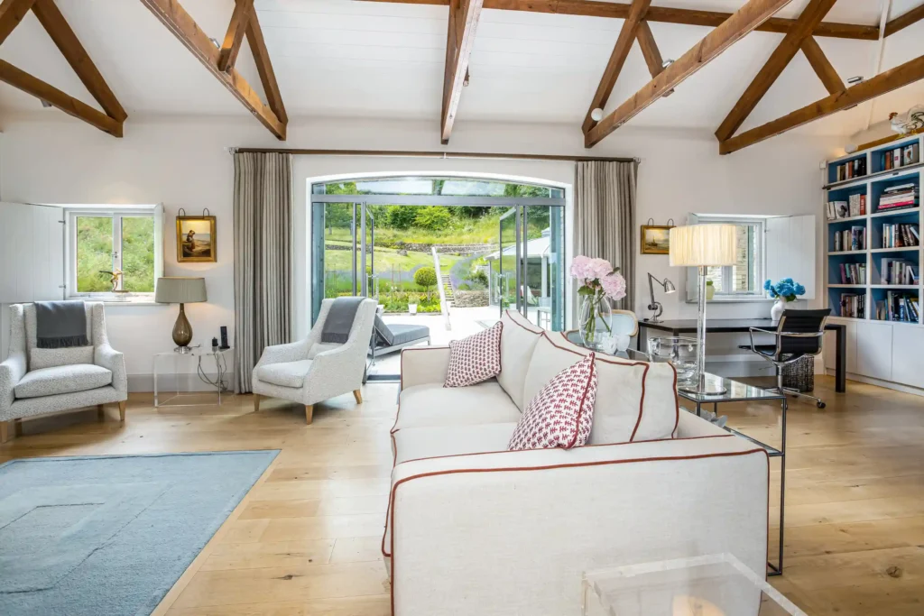 Explore Rectory Barn, a £4.5M luxury Salcombe home featuring a secret wine cellar, stunning estuary views, 1.56 acres, 4 bedrooms, and a hydro pool gym. Coastal elegance!