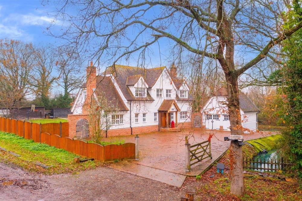 Unique 4-bed home with 3 fishing lakes on 7 acres in Rayleigh, Essex, offers tranquil living and a thriving business opportunity, now on sale for £1.6M.