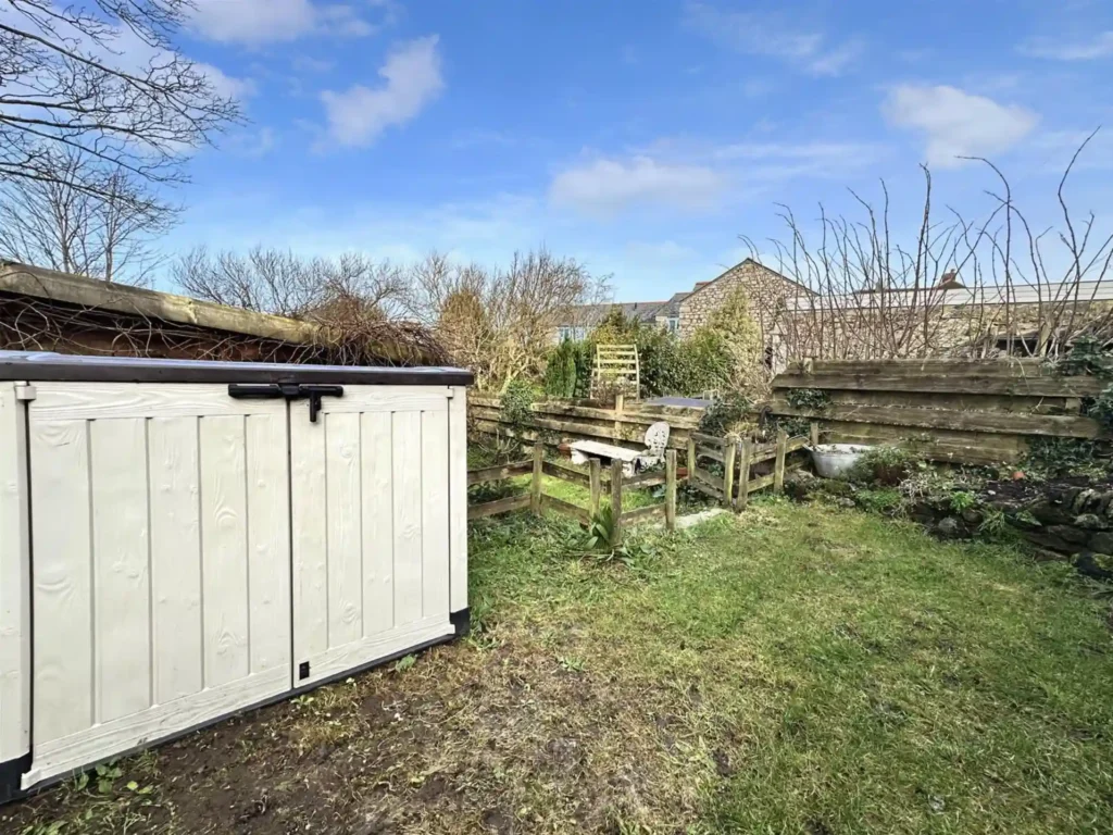 Bob Fitzsimmons’ childhood home, a charming Grade II listed cottage in Helston, Cornwall, is now for sale at £220,000, offering history, modern updates, and a serene garden.