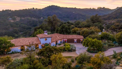 A nearly 10-acre ranch once owned by Renee Zellweger is on the market for $8m. The Spanish-style estate in LA’s Topanga Hills offers privacy, luxury, and stunning views.