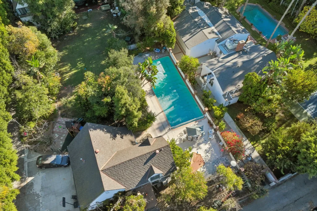 The iconic ‘Gloria Vanderbilt Estate’ in Beverly Hills is on the market for $16.5M - a historic mansion once graced by Hollywood legends.