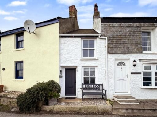 One of Britain's narrowest homes, The Doll's House in Porthleven, Cornwall, is for sale at £235,000 - offering stunning sea views and a charming coastal retreat.