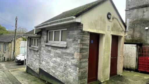 A former public toilet in Penryn, Cornwall, sold for £28,000—nearly three times its guide price—after attracting high demand due to its central location and potential use.