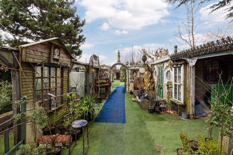 A quirky bungalow in Wigan with its own garden centre and whimsical decor is on the market for £495,000 - offering unique living space and exciting development potential.