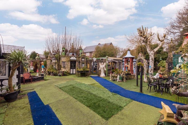 A quirky bungalow in Wigan with its own garden centre and whimsical decor is on the market for £495,000 - offering unique living space and exciting development potential.