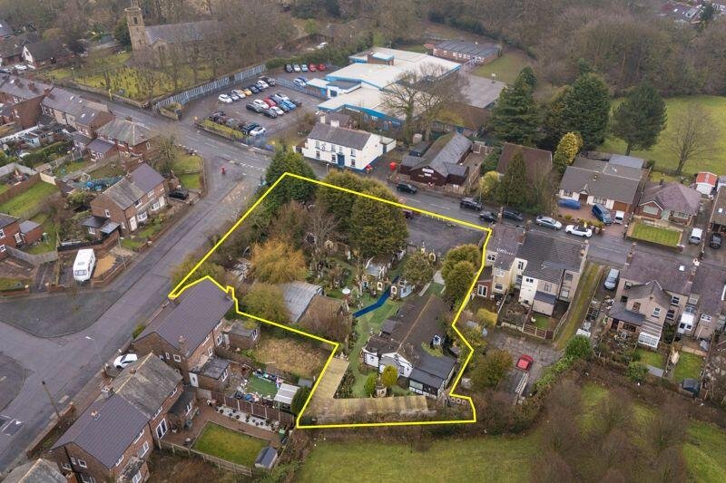 A quirky bungalow in Wigan with its own garden centre and whimsical decor is on the market for £495,000 - offering unique living space and exciting development potential.