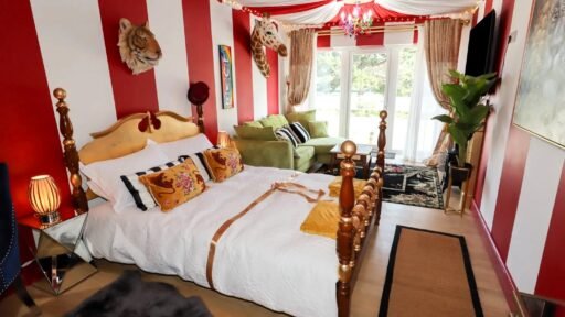 A retired nurse transformed a holiday home in Wales into a circus-themed retreat, complete with striped walls and vintage décor, delighting guests with its playful charm.