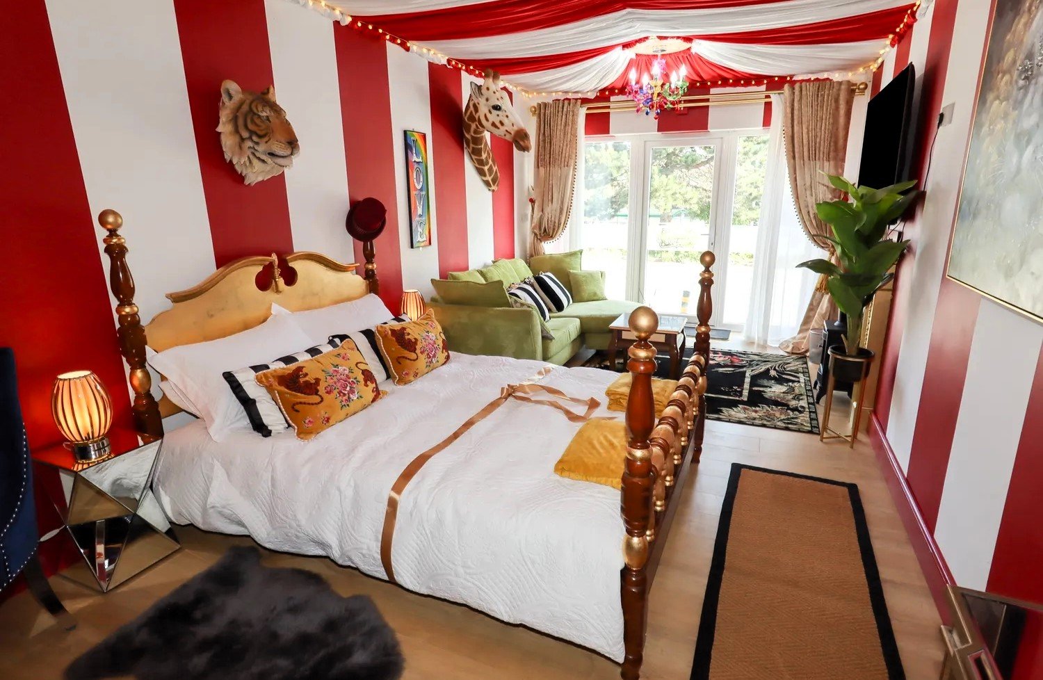 A retired nurse transformed a holiday home in Wales into a circus-themed retreat, complete with striped walls and vintage décor, delighting guests with its playful charm.