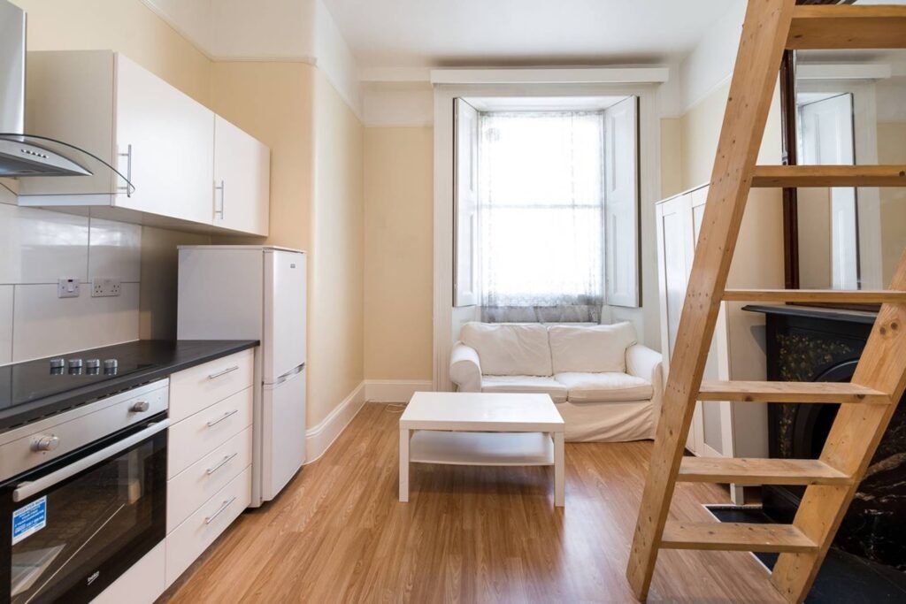 A tiny Chelsea studio flat, smaller than a six-yard box, is up for rent at £1,560-a-month - with a loft bed over the kitchen, no pets allowed, and limited headroom.