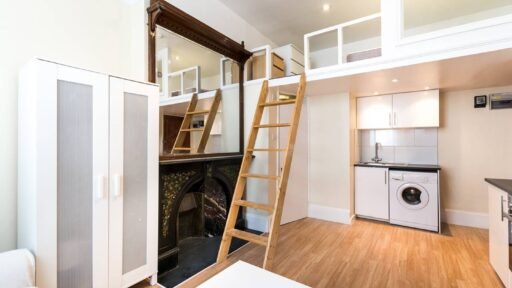 A tiny Chelsea studio flat, smaller than a six-yard box, is up for rent at £1,560-a-month - with a loft bed over the kitchen, no pets allowed, and limited headroom.