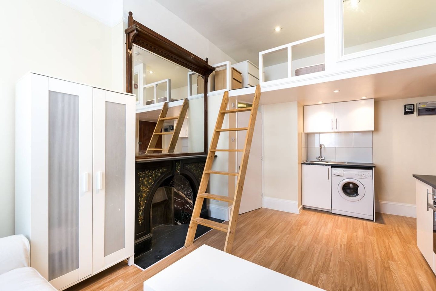 A tiny Chelsea studio flat, smaller than a six-yard box, is up for rent at £1,560-a-month - with a loft bed over the kitchen, no pets allowed, and limited headroom.