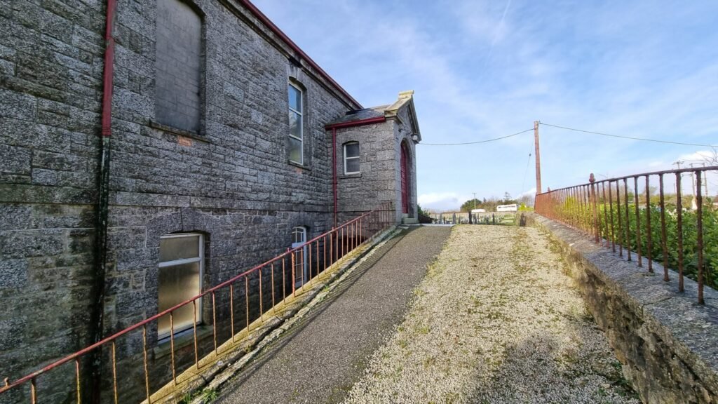 A Grade II-listed Wesleyan Methodist church in Penryn, Cornwall, featuring an organ loft and graveyard, is for sale at £195,000 with residential conversion potential.