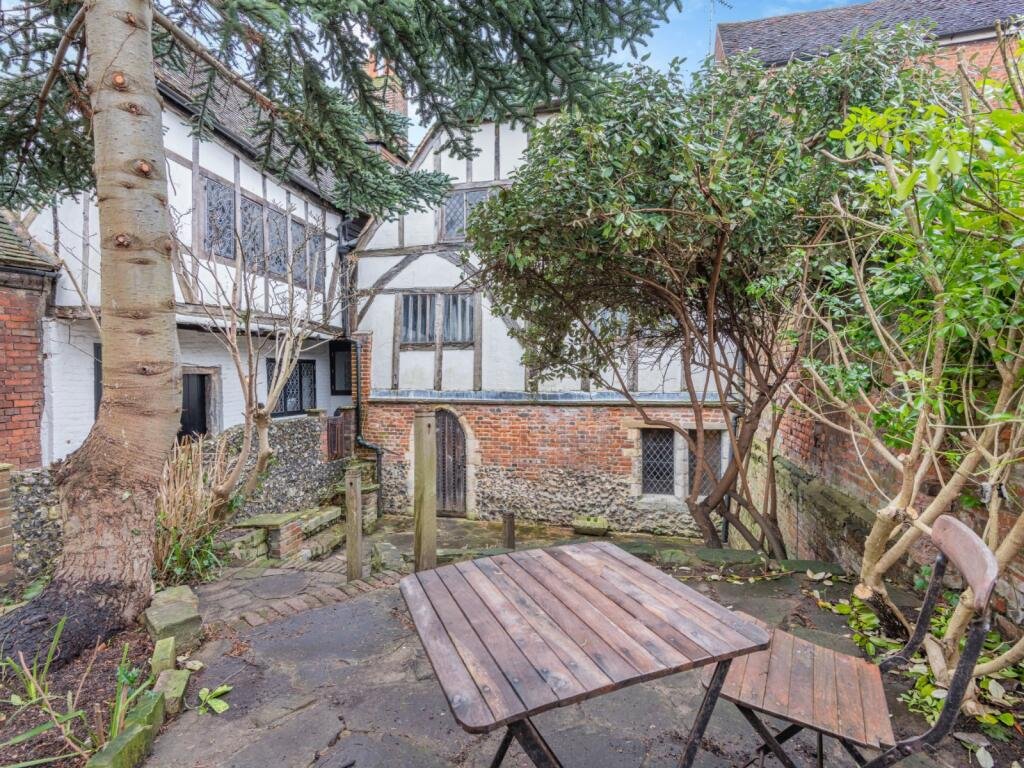 Historic Canterbury home where knights plotted to kill Thomas Becket hits market for £750,000 - features Norman undercroft, timber frame, and modern comforts.