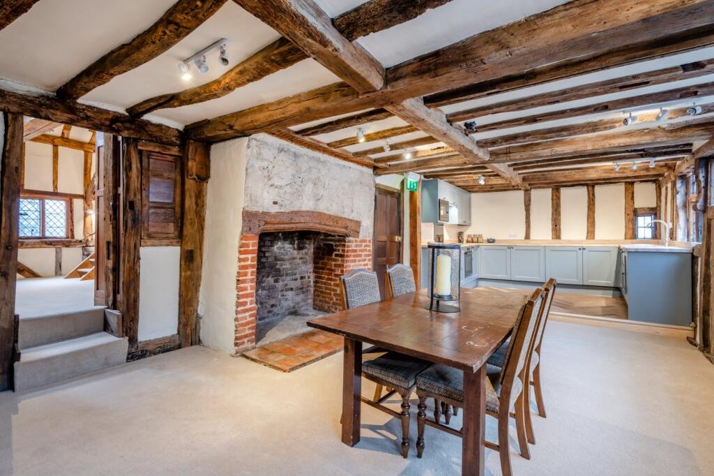 Historic Canterbury home where knights plotted to kill Thomas Becket hits market for £750,000 - features Norman undercroft, timber frame, and modern comforts.