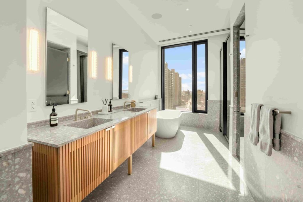 Ben Simmons has listed his \$17M Brooklyn penthouse in the Olympia Dumbo building, featuring skyline views, luxury interiors, and elite amenities after moving to LA.