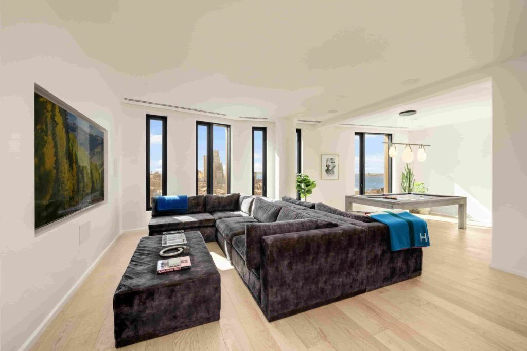 Ben Simmons has listed his \$17M Brooklyn penthouse in the Olympia Dumbo building, featuring skyline views, luxury interiors, and elite amenities after moving to LA.