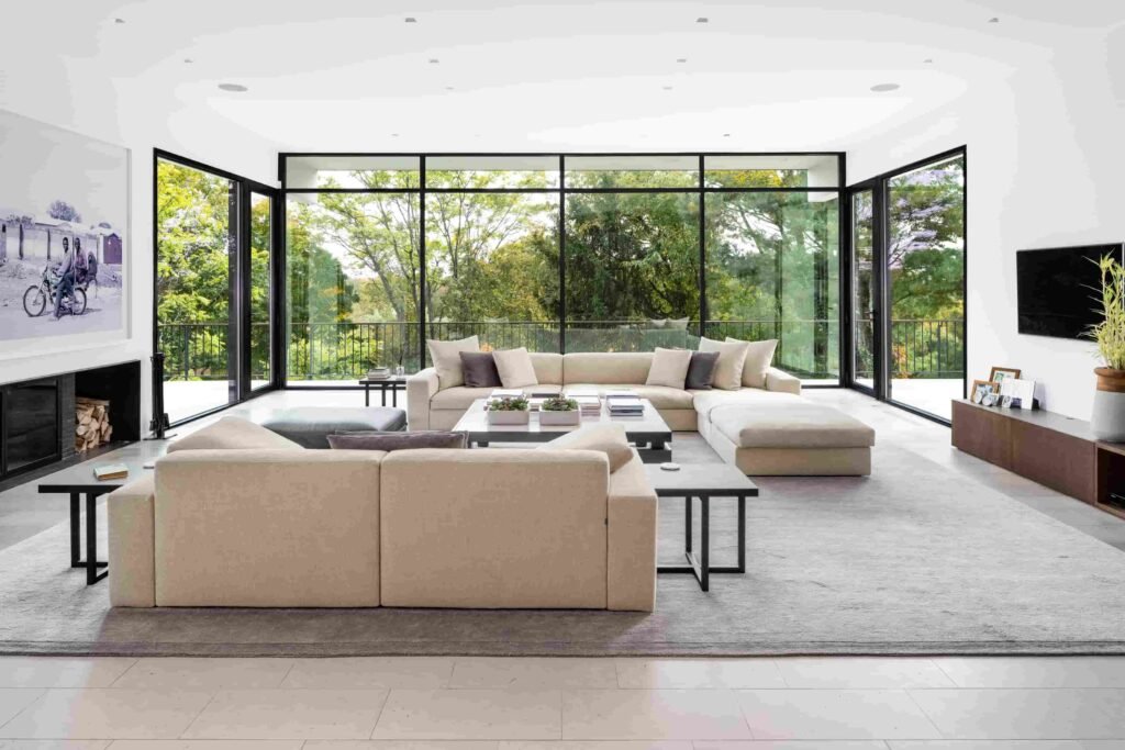 A luxury Rye home redesigned by Yale dean Deborah Berke is on sale for \$4.95m - featuring skylights, a heated pool, spa suite and award-winning architectural design.