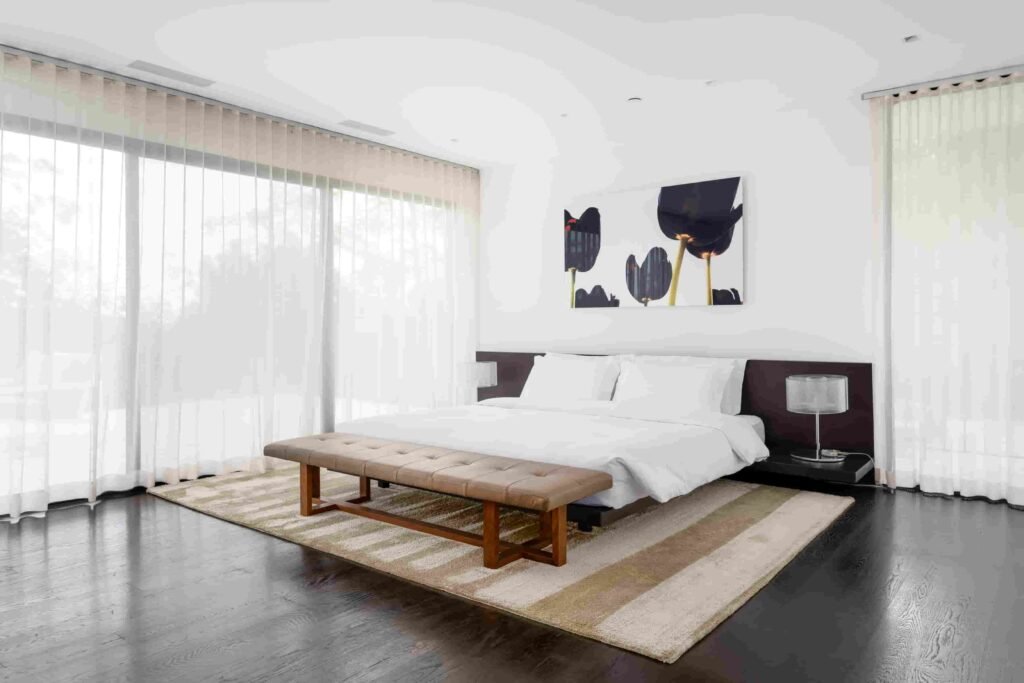 A luxury Rye home redesigned by Yale dean Deborah Berke is on sale for \$4.95m - featuring skylights, a heated pool, spa suite and award-winning architectural design.