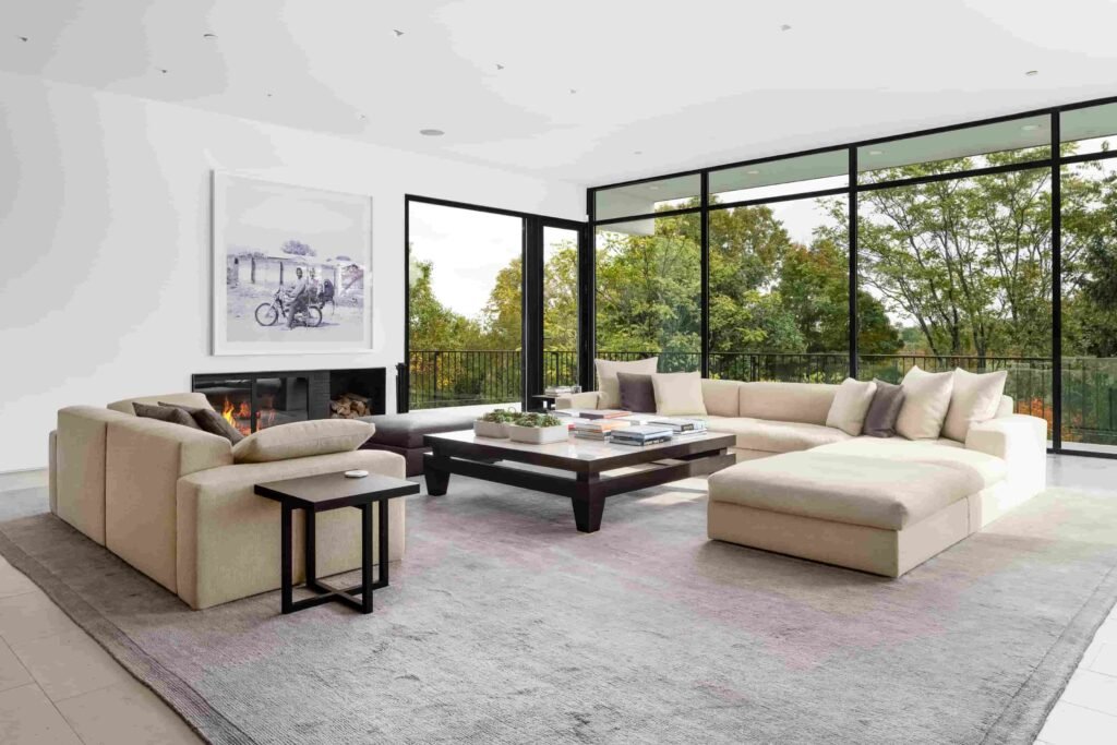 A luxury Rye home redesigned by Yale dean Deborah Berke is on sale for \$4.95m - featuring skylights, a heated pool, spa suite and award-winning architectural design.