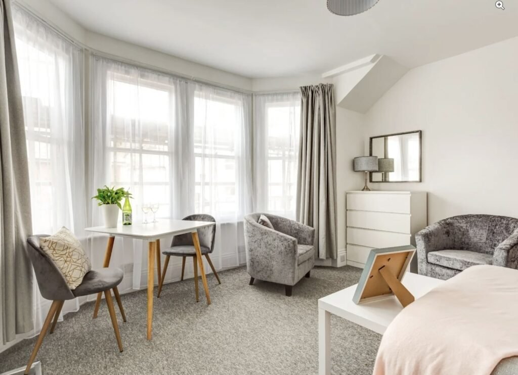 A £900-a-month seafront studio flat in Eastbourne features a kitchen in a cupboard, with a stove, sink and fridge squeezed in, and is only suitable for single tenants.