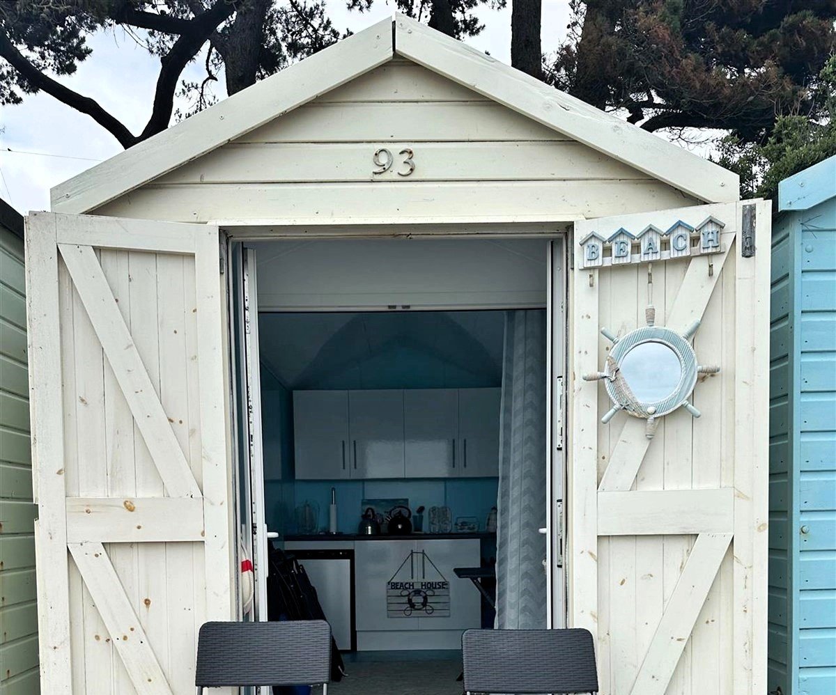 A tiny 13ft beach hut on Avon Beach, Dorset, with sea views and minimal facilities is on sale for £110,000 - offering a private summer spot despite no toilets or showers.