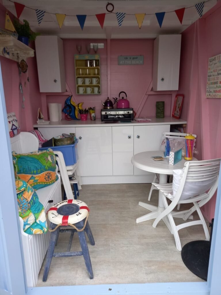 A tiny 13ft beach hut on Avon Beach, Dorset, with sea views and minimal facilities is on sale for £110,000 - offering a private summer spot despite no toilets or showers.