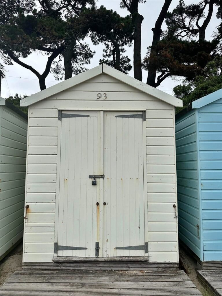 A tiny 13ft beach hut on Avon Beach, Dorset, with sea views and minimal facilities is on sale for £110,000 - offering a private summer spot despite no toilets or showers.