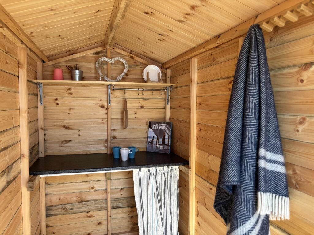 A tiny 4x8ft beach hut in Swanage is for sale at £55,000 - offering sea views, freehold ownership and no stamp duty, making it a rare coastal investment opportunity.