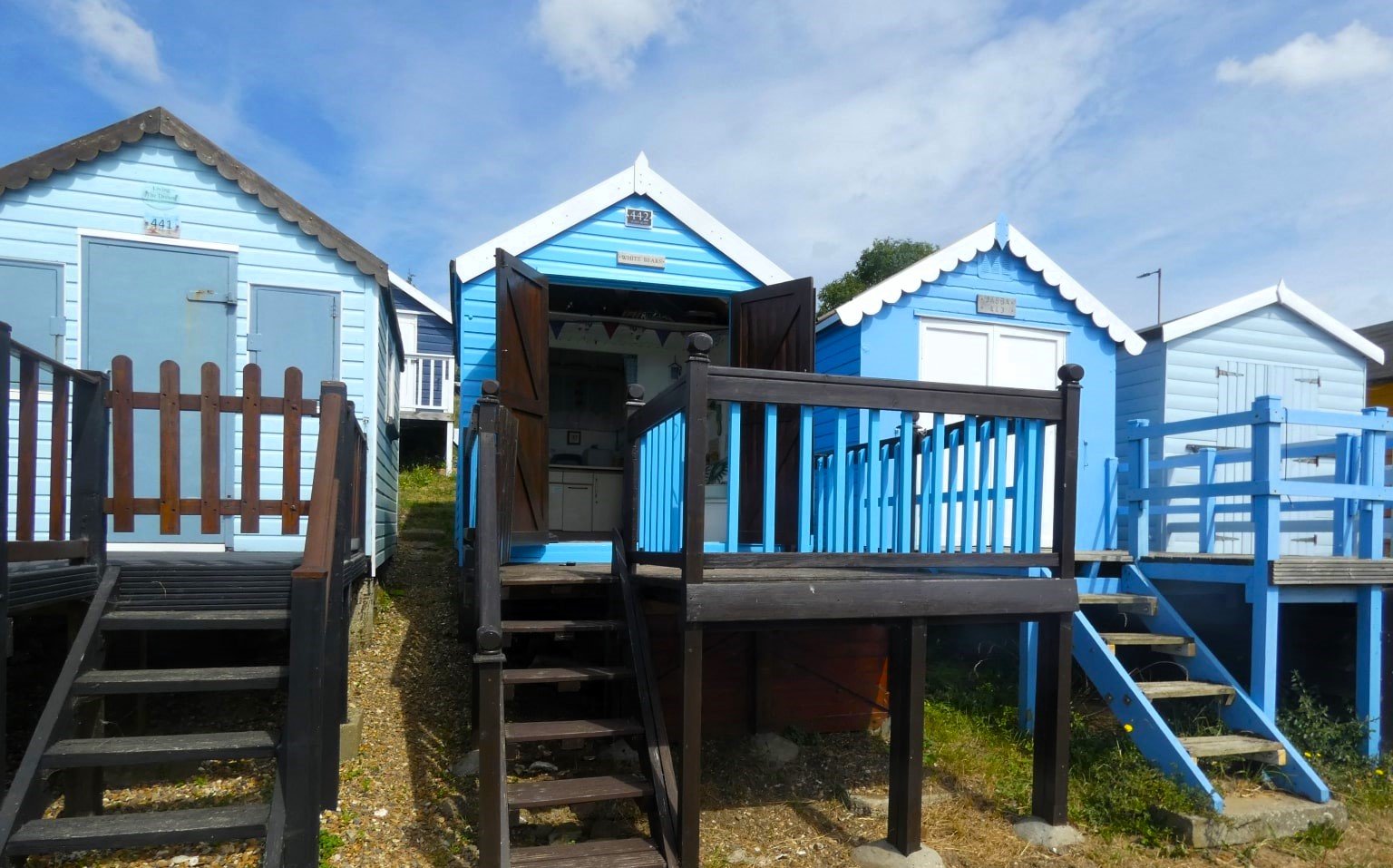 Charming beach hut in West Mersea hits the market for just £47,500 - over £25,000 cheaper than others - complete with veranda, storage, and scenic estuary views.