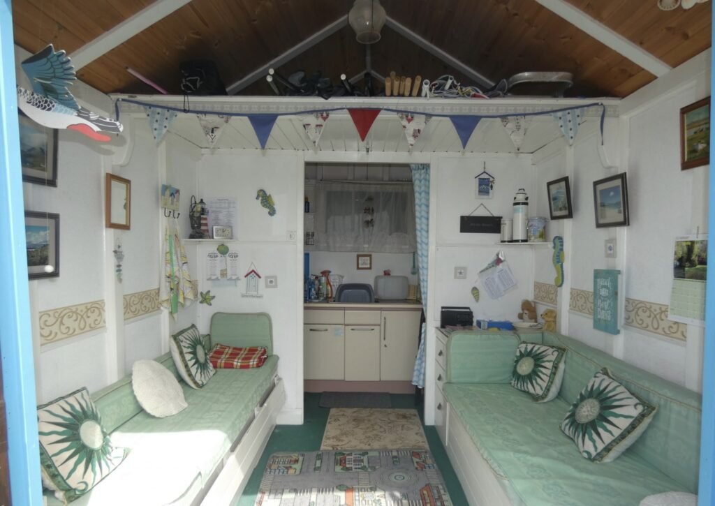 Charming beach hut in West Mersea hits the market for just £47,500 - over £25,000 cheaper than others - complete with veranda, storage, and scenic estuary views.