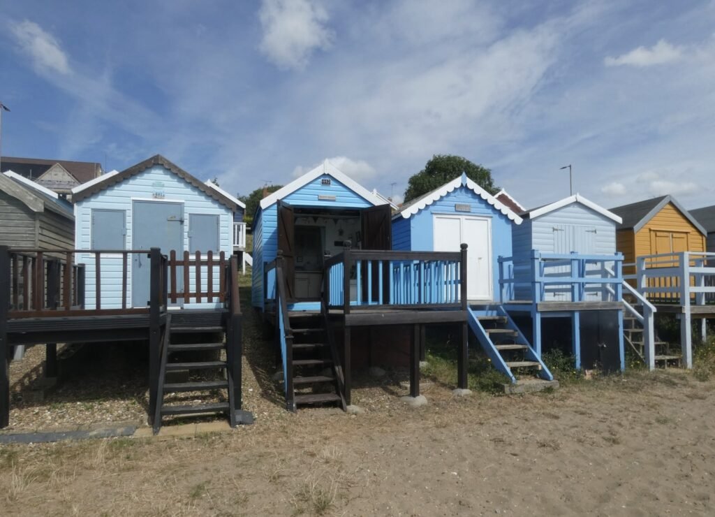 Charming beach hut in West Mersea hits the market for just £47,500 - over £25,000 cheaper than others - complete with veranda, storage, and scenic estuary views.