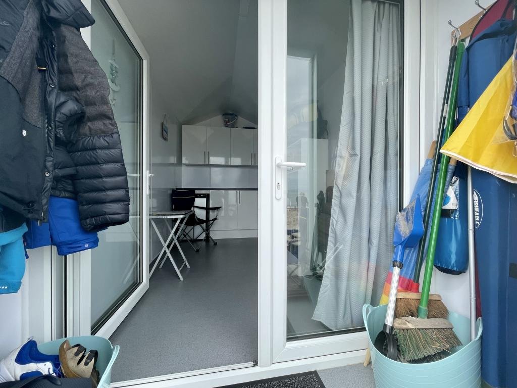 This £120,000 beach hut on Avon Beach offers stunning views and a kitchen but no toilet, leaving owners queuing for public loos just meters from the water’s edge.