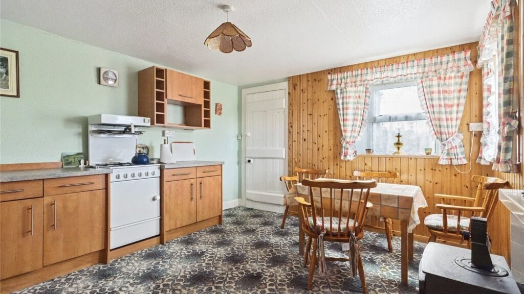 One of the UK's most remote homes, a former schoolhouse in Caithness near a Unesco World Heritage Site, is for sale at £120K with vast views and rich historical charm.