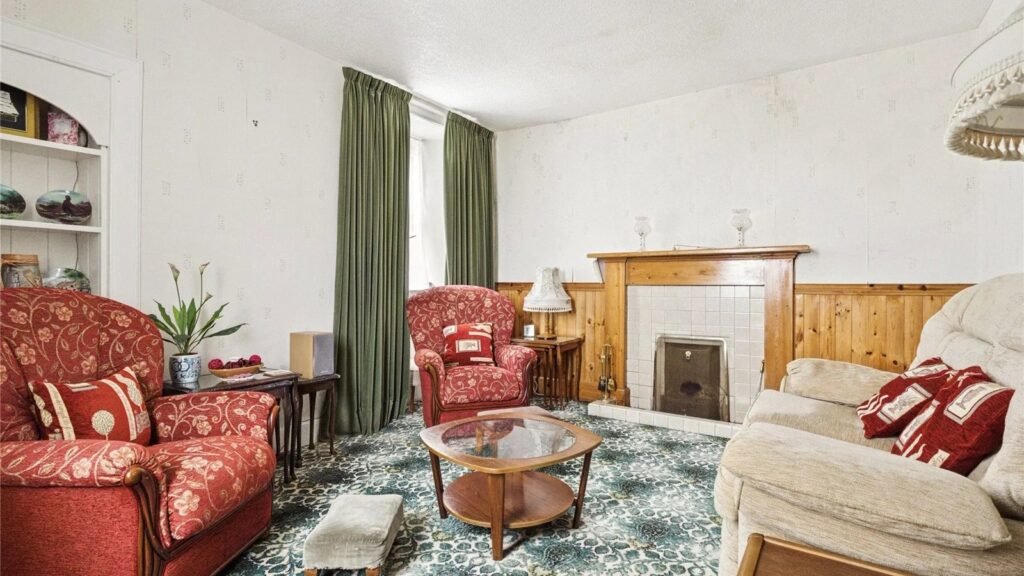 One of the UK's most remote homes, a former schoolhouse in Caithness near a Unesco World Heritage Site, is for sale at £120K with vast views and rich historical charm.