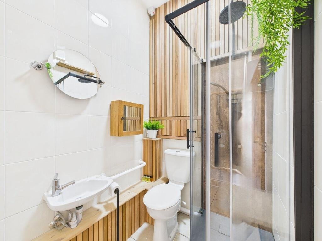 A former public toilet in Ramsgate, now a £110,000 mini bungalow with a courtyard, kitchenette and shower room, offers quirky charm and potential near the town centre.