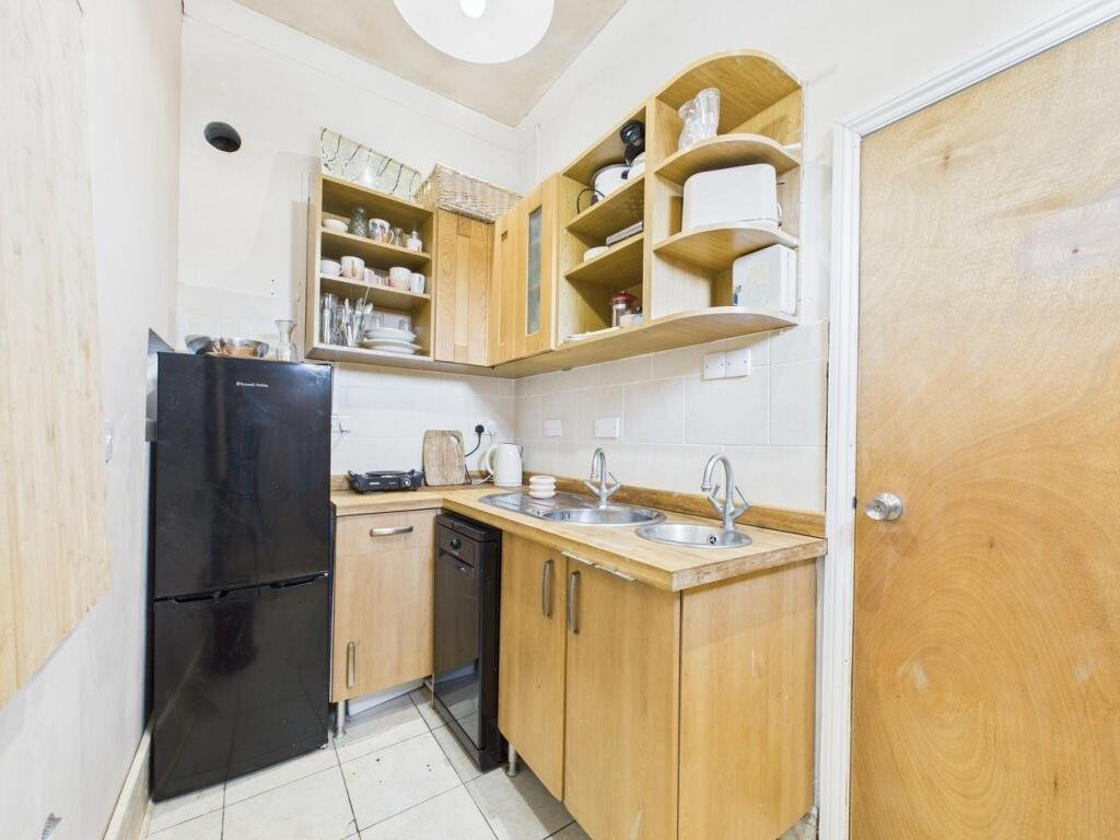 A former public toilet in Ramsgate, now a £110,000 mini bungalow with a courtyard, kitchenette and shower room, offers quirky charm and potential near the town centre.