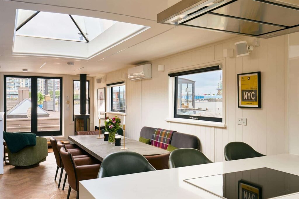 A stunning £1.5m Spitz barge in London with four en-suite bedrooms, panoramic views, and luxury interiors offers rare riverside living just minutes from Central London.