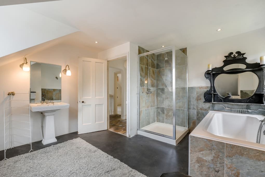 This quirky eight-bedroom East Sussex home has hit the market for £700,000 - complete with four floors, charm, and a jail-like bathroom that’s turning heads.