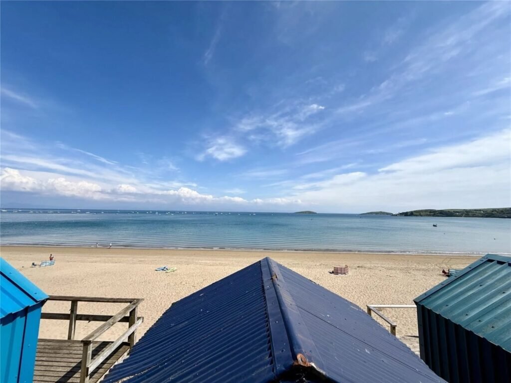 A £150,000 beach hut in Abersoch is up for sale, matching the price of a local house, offering sea views, a balcony and changing area but no seating or kitchen.