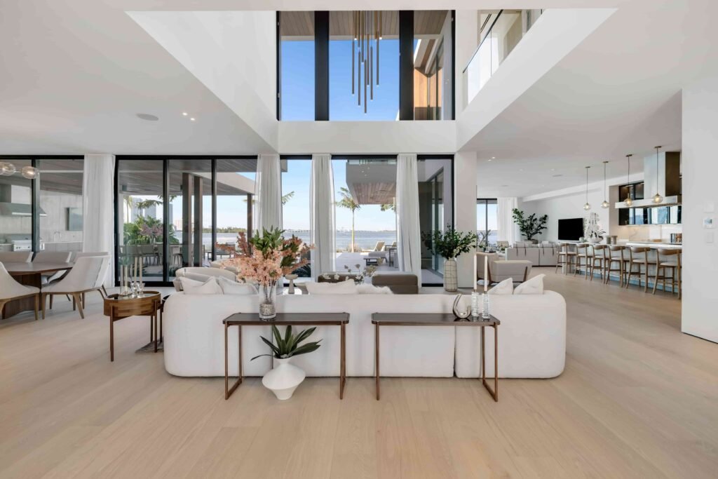 Eddie Irvine lists his £27.6m Miami estate with 6 bedrooms, rooftop views, a pool, boat lift, smart tech, and eco features just steps from Biscayne Bay’s waterfront.
